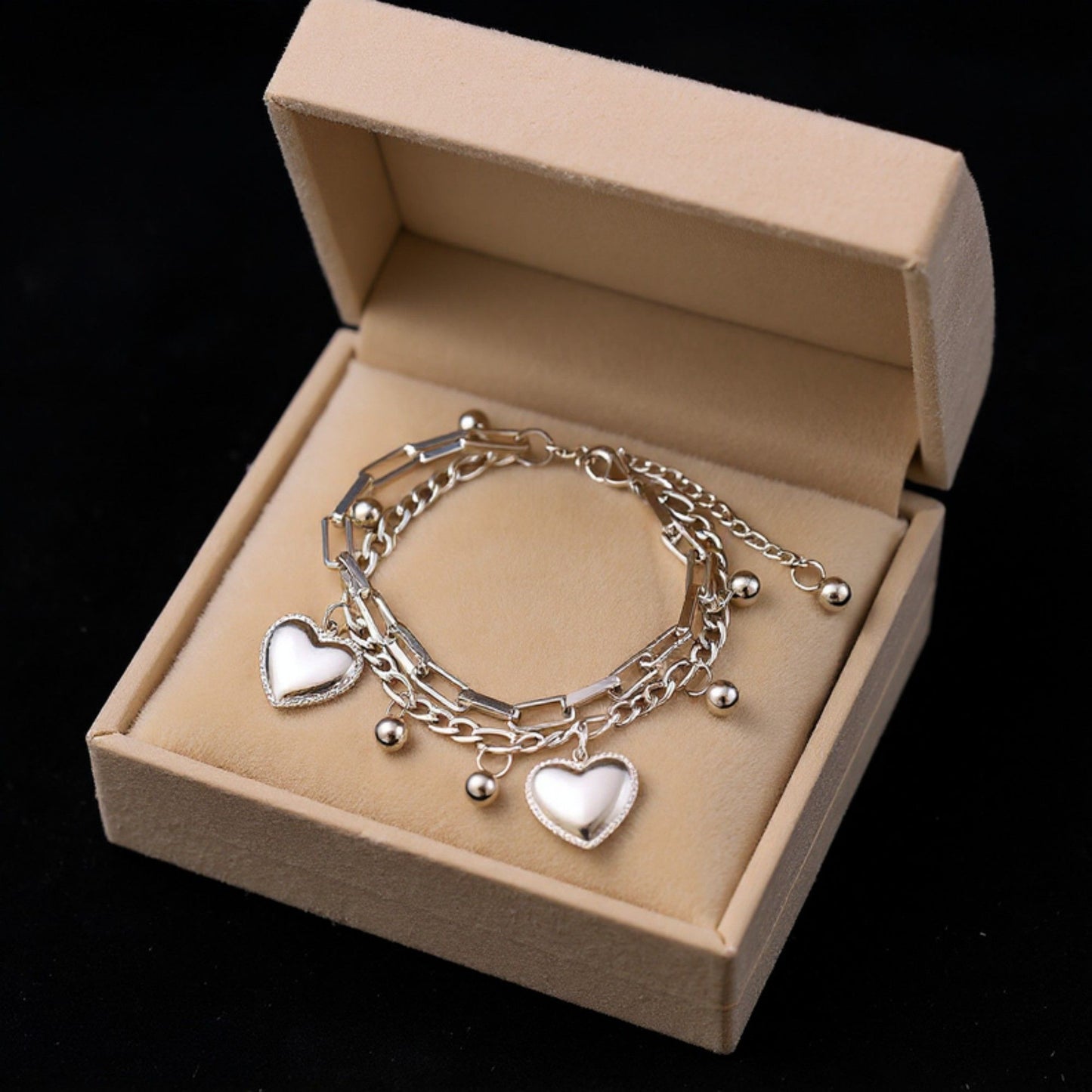 Layered Chain Bracelet with Dual Heart Charms and Dangling Bead Accents for a Playful Feminine Accessory with Modern Detail