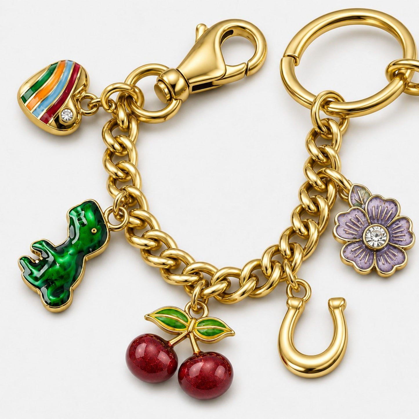 Gold Tone Charm Chain Bag Accessory with Cherry Dinosaur Heart Flower and Horseshoe Accents