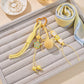 Bag Charm with Hanging Strap and Decorative Accents