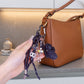Multi-Charm Accessory with Hanging Clip and Letter Accents