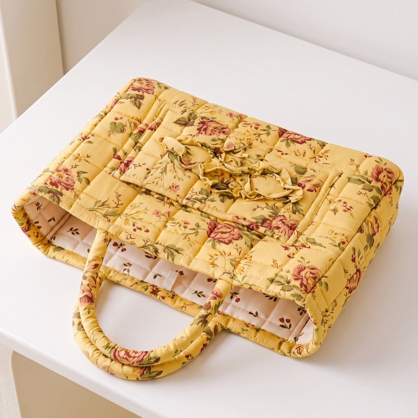 Quilted Floral Storage Basket with Handles and Front Pocket