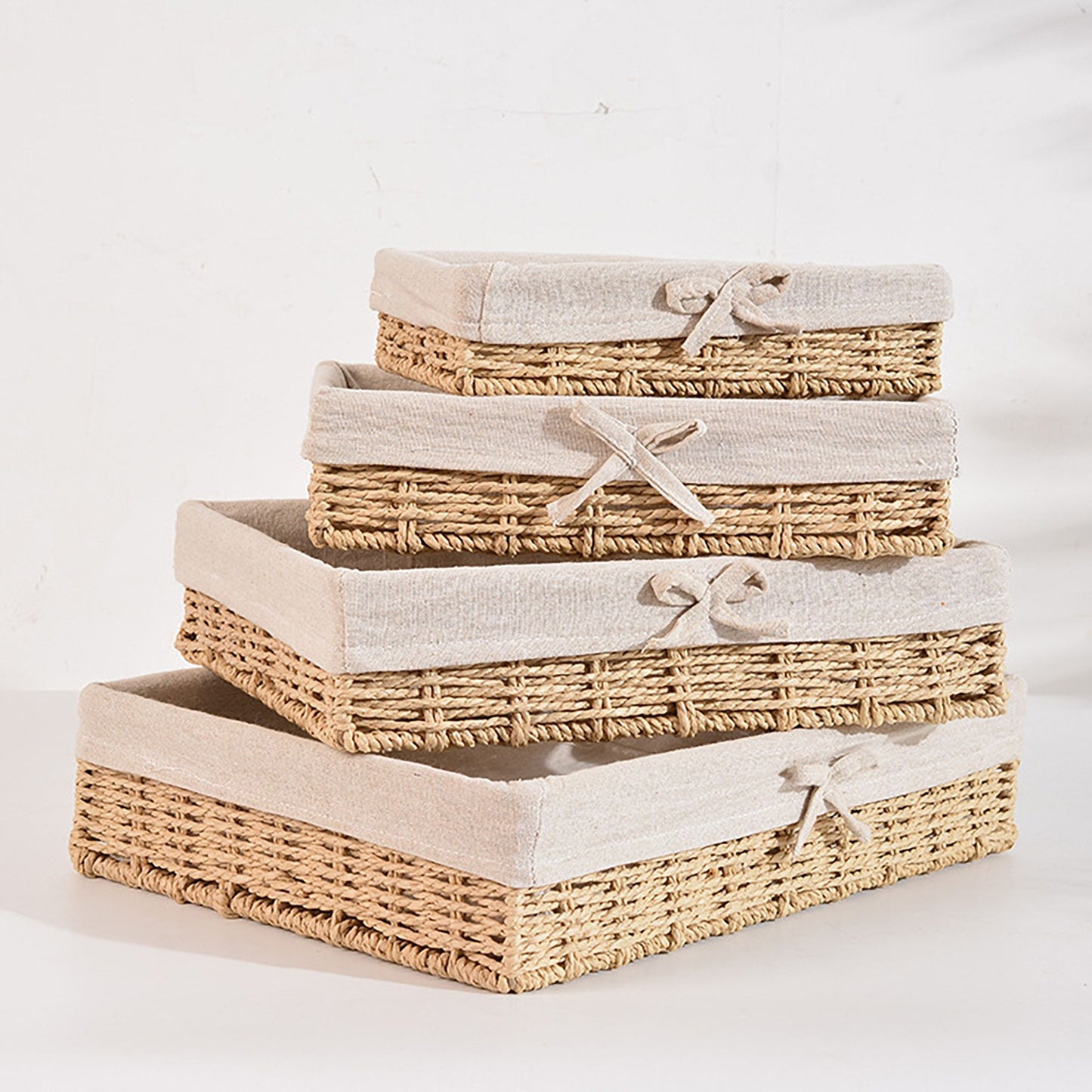 4 Piece Woven Storage Basket Set with Fabric Lining and Bows