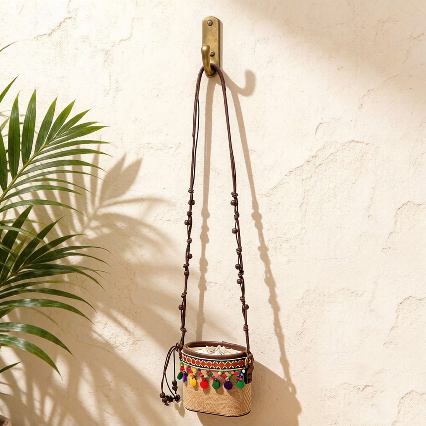 Woven Straw Mini Crossbody Bag with Tassel Detail Drawstring Closure Small Cylinder Handbag