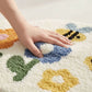 Tufted Floor Mat with Happy Text and Floral Pattern Non Slip Backing Soft Plush Decorative Scalloped Edge Indoor Rug