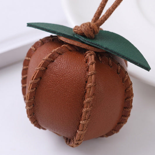 2-Piece Womens Faux Leather Bag Charm with Cord Loop Leaf Accent and Textured Stitch Detail