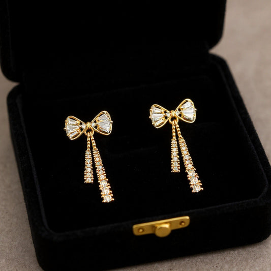 Elegant Bow Drop Earrings with Sparkling Tapered Accents and Delicate Dangling Strands for a Refined Feminine Statement Look