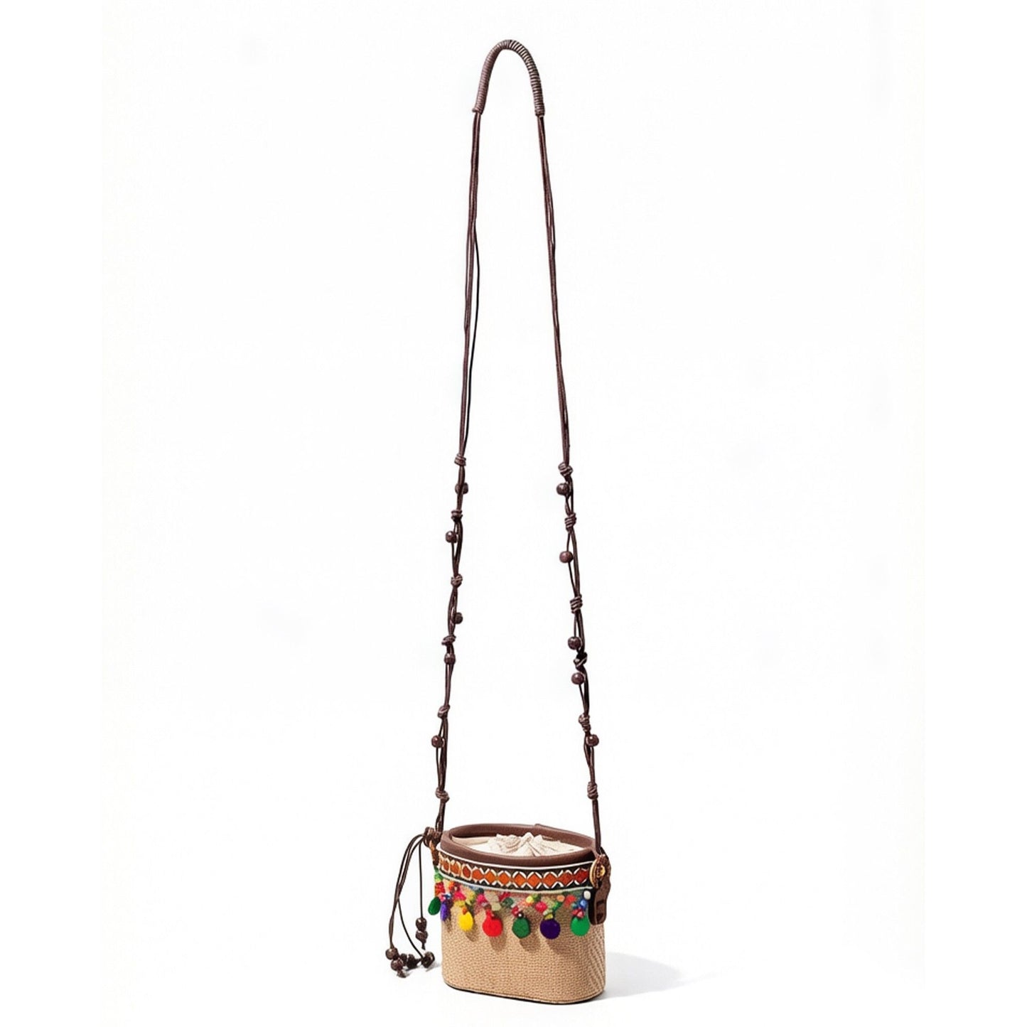 Woven Straw Mini Crossbody Bag with Tassel Detail Drawstring Closure Small Cylinder Handbag