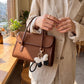 2-Piece Womens Faux Leather Bag Charm Keychain with Braided Wrist Strap and Gold Tone Ring