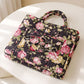 Quilted Floral Storage Basket with Handles and Front Pocket