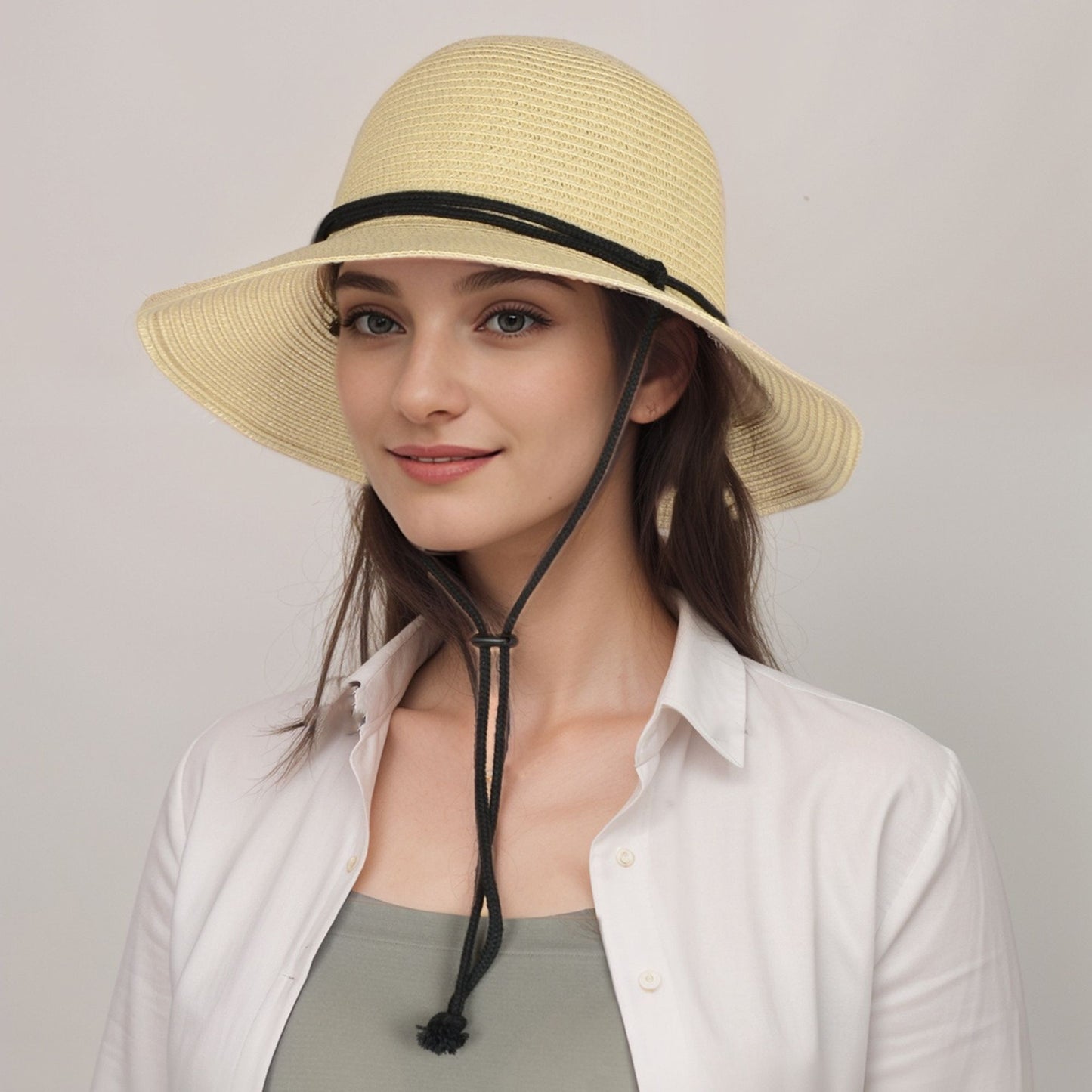 Wide Brim Straw Sun Hat with Chin Strap and Black Cord Detail for Outdoor Protection and Stylish Shade
