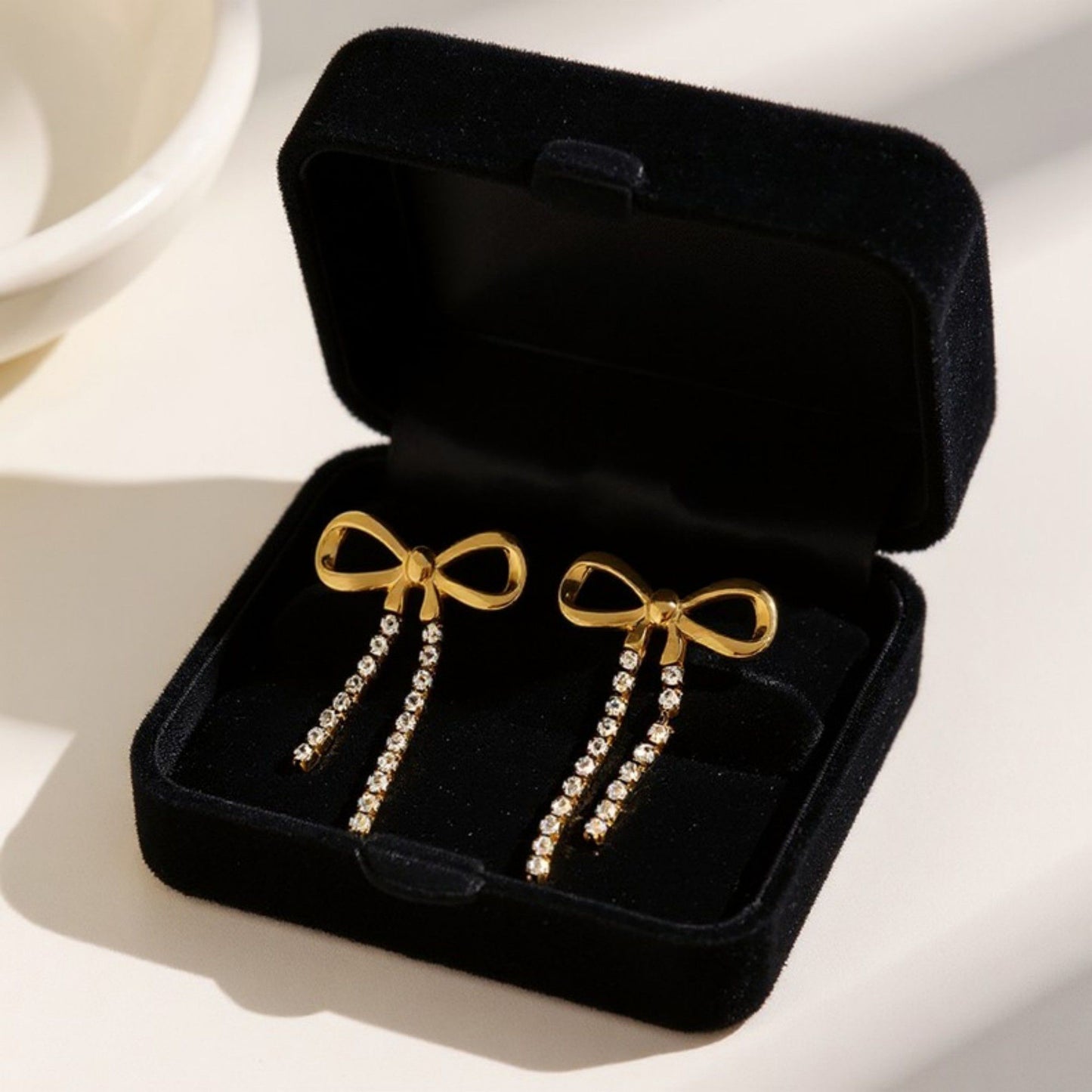 Bow Drop Earrings with Rhinestone Dangle Detail Feminine Statement Jewelry