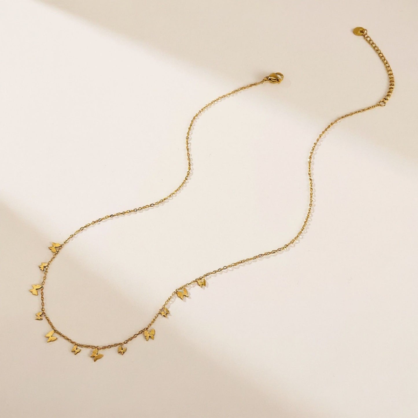 Butterfly Charm Necklace with Delicate Miniature Pendant Accents and Dainty Chain Design for a Soft Feminine Layered Look