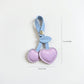 2-Piece Womens Padded Bag Charm with Hanging Strap and Stitched Detail