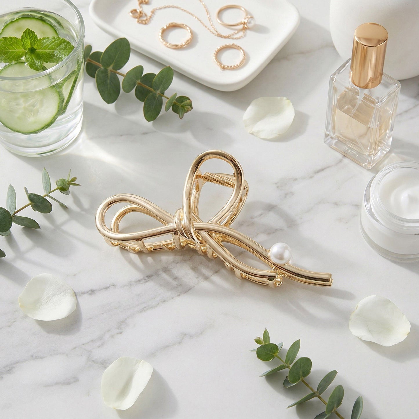 Bow Shaped Hair Clip with Faux Pearl Accent and Open Frame Design 4.5x1in