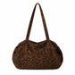 Leopard Print Barrel Shoulder Bag with Zip Closure and Interior Pockets