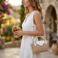 Women's Mini Woven Crossbody Bag with Top Handle Adjustable Strap and Charm