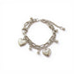 Layered Chain Bracelet with Dual Heart Charms and Dangling Bead Accents for a Playful Feminine Accessory with Modern Detail