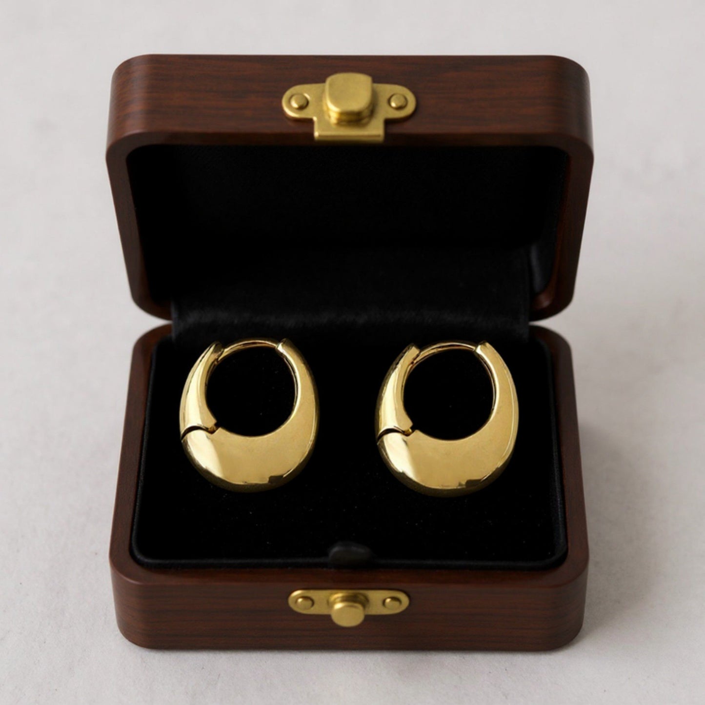 Women's Thick Hoop Earrings with Rounded Modern Design