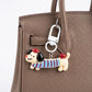 2-Piece Dachshund Dog Keychain Bag Charm Striped Sweater Apple Accent Clip Key Ring