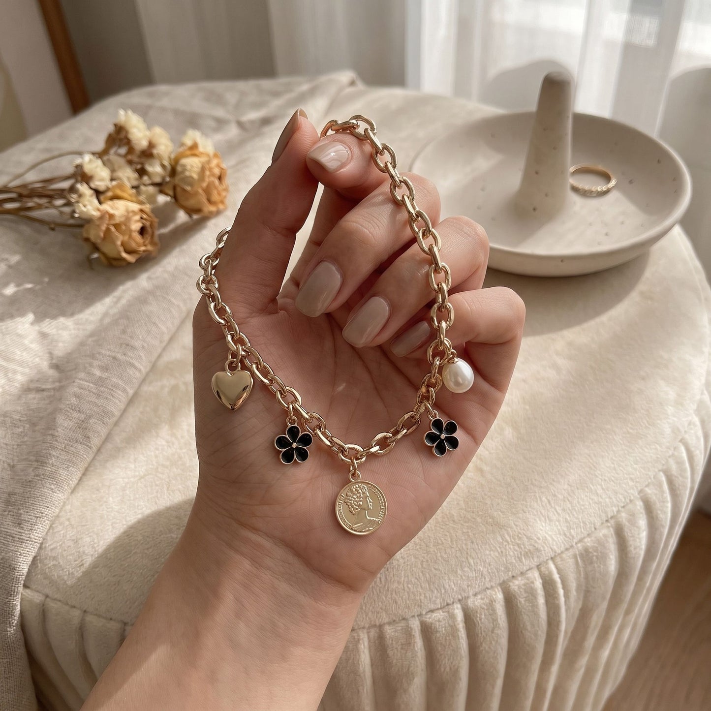 Gold Tone Bag Charm Chain with Black Flower Heart Pearl and Coin Style Charms