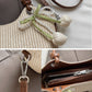 Women's Woven Mini Tote Crossbody Bag with Pearl Bow Charm and Strap