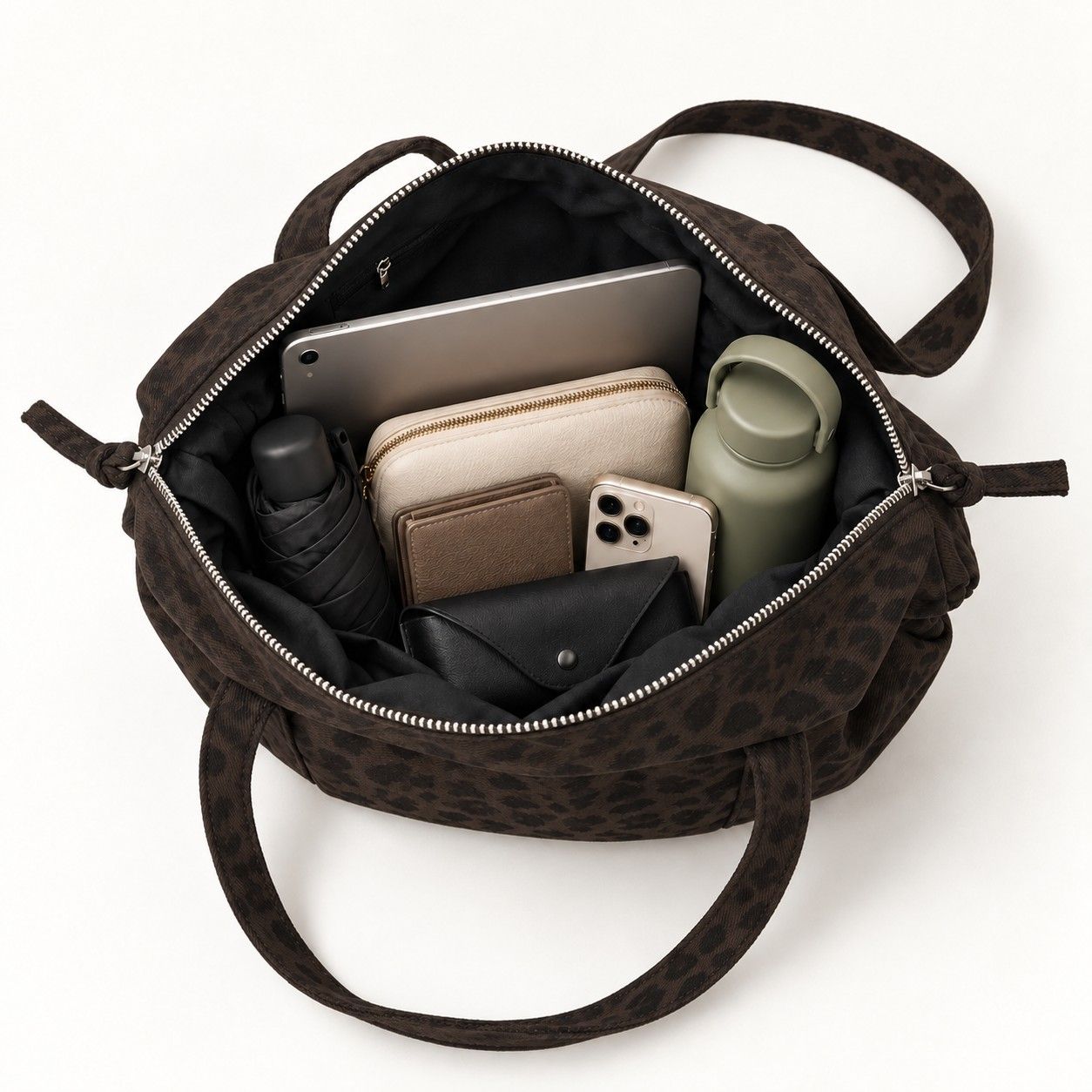 Leopard Print Barrel Shoulder Bag with Zip Closure and Interior Pockets