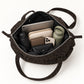 Leopard Print Barrel Shoulder Bag with Zip Closure and Interior Pockets