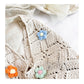 Women's Crochet Woven Shoulder Bag with Floral Applique Open Knit Hobo Design