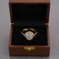 Women's White Jade Ring with Crystal Halo and Green Gemstone Accents