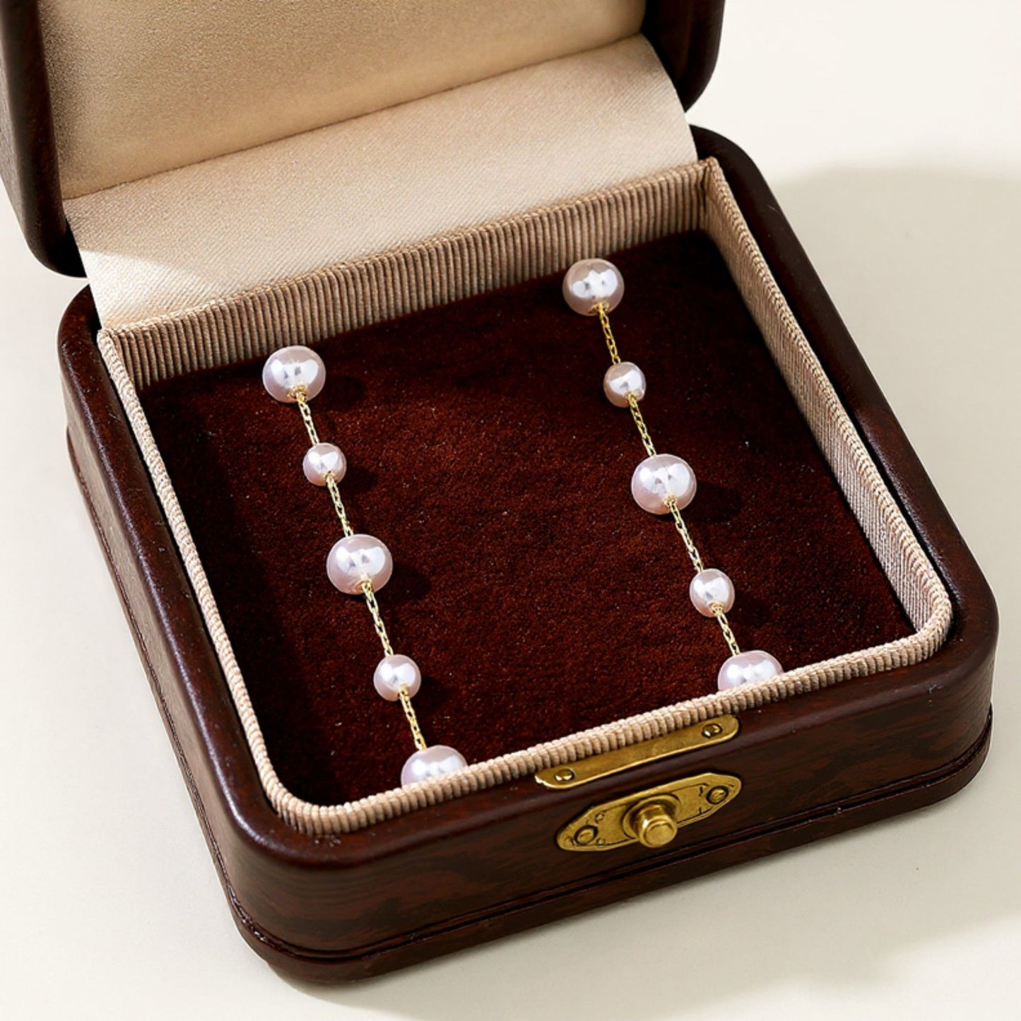 Pearl Drop Earrings with Delicate Chain Detailing and Graduated Bead Accents for a Soft Feminine Modern Elegant Accessory