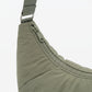 Padded Crescent Shoulder Bag with Wide Strap and Top Zipper Closure 13x7.5x2.5in