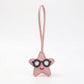 2-Piece Womens Faux Leather Bag Charm with Long Hanging Strap and Layered Detail