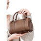 Structured Leather Barrel Satchel with Top Handles Compact Cylinder Shape and Crossbody Option