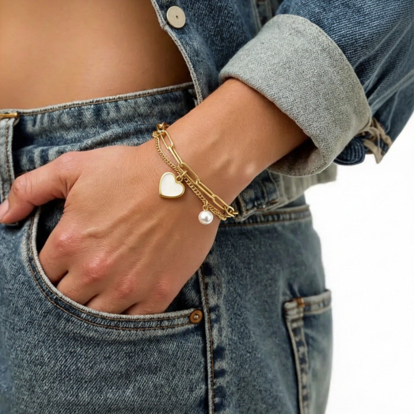Double Layer Chain Bracelet with Heart Charm Pendant and Smooth Bead Drop Detail for a Delicate Feminine Layered Look
