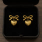 Women's Bow Stud Earrings with Metallic Heart Dangle Charm and Polished Modern Cute Design