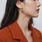 Abstract Enamel Drop Earrings with Textured Metal Frame and Pearl Accent for a Modern Artistic Feminine Statement Accessory