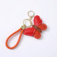 2-Piece Womens Faux Leather Bag Charm Keychain with Braided Wrist Strap and Gold Tone Ring
