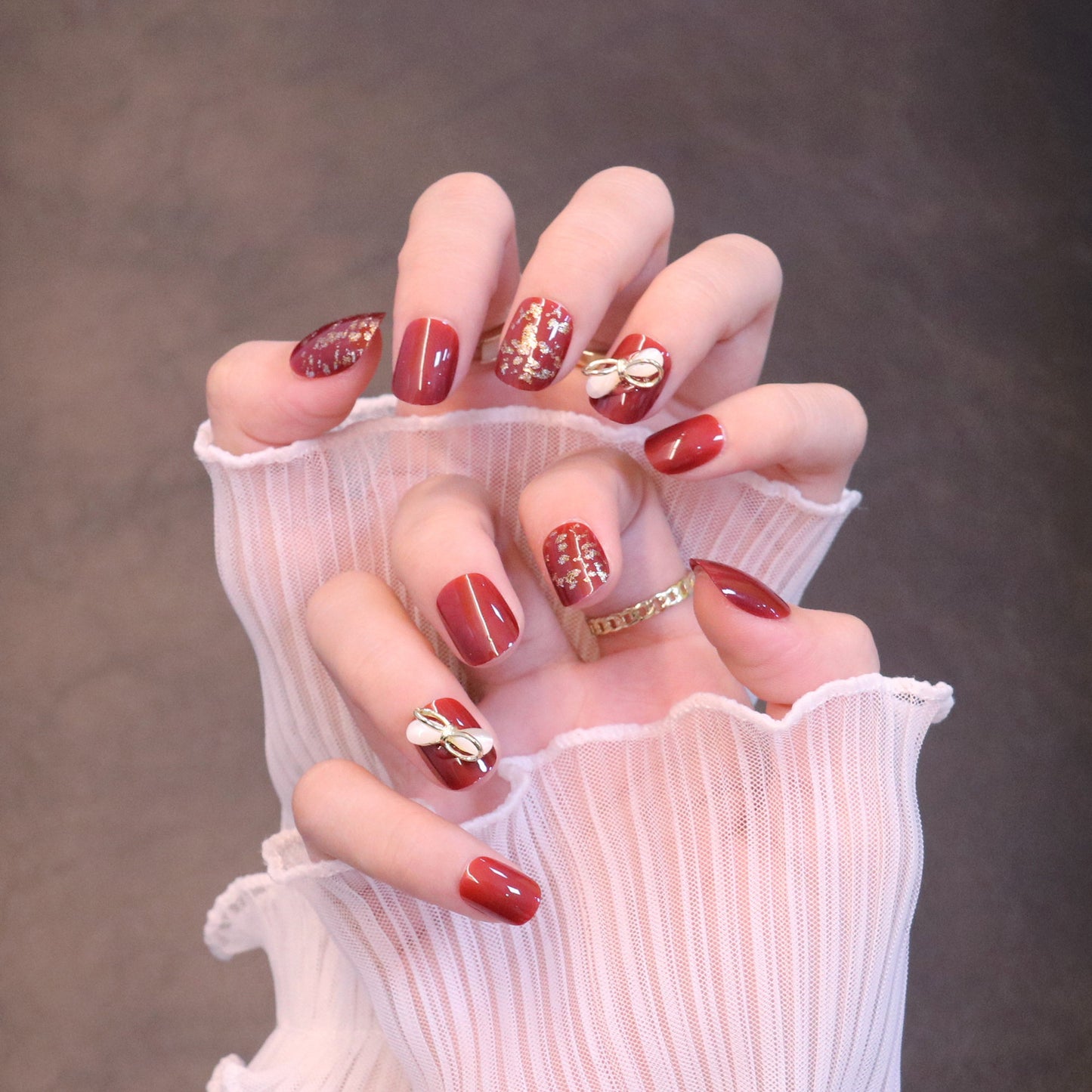 Short Squared Oval Bold Red Press On Nails with Bow Charm