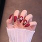 Medium Almond Matte Red Press On Nails with Flower and Moon Charms