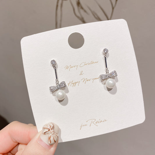 Pearl and Bow Silver Dangle Earring