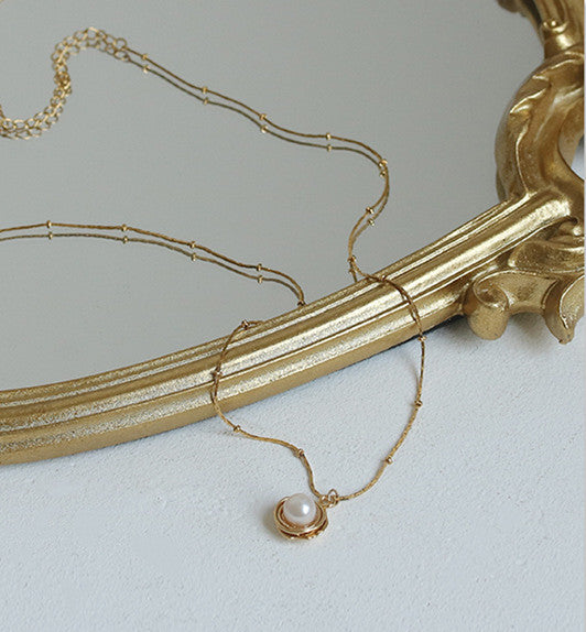 Nestled Pearl Gold Necklace