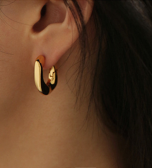 Uneven Surfaced Gold Buckle Earrings