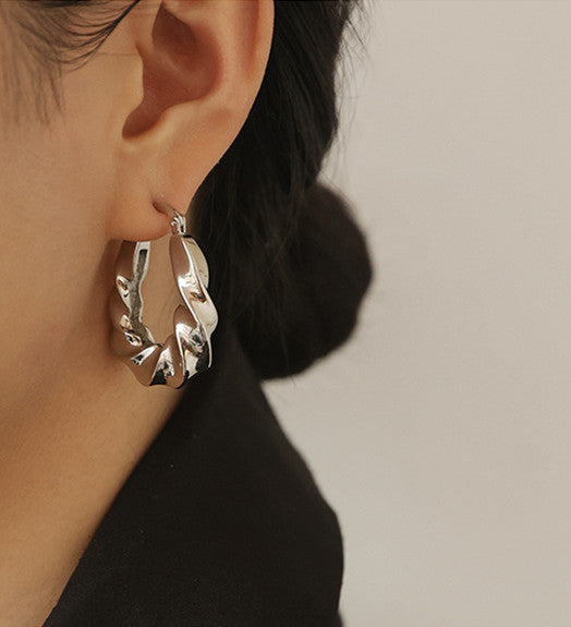 Twisting Hoop Silver Earrings