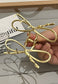 Metallic Bow Design Hair Claw